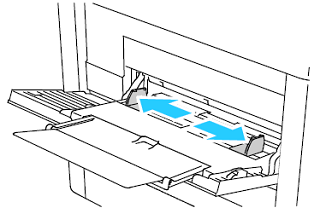 Move the width guides to the edges of the tray