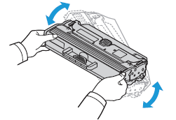 Slowly shake the new cartridge five or six times to distribute the toner evenly inside the cartridge