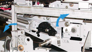 Engage the Latch Bar on the Transfer Drawer and lock it. Latch the Paper Path Module.