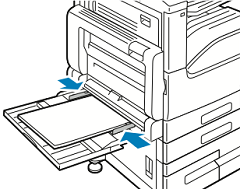 Adjust the width guides until they touch the edges of the paper