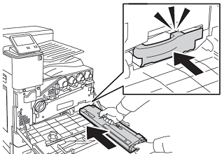 Insert the new waste cartridge into the printer until it clicks into place.