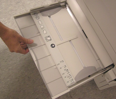 Open the Bypass Tray, located on the left side of the printer